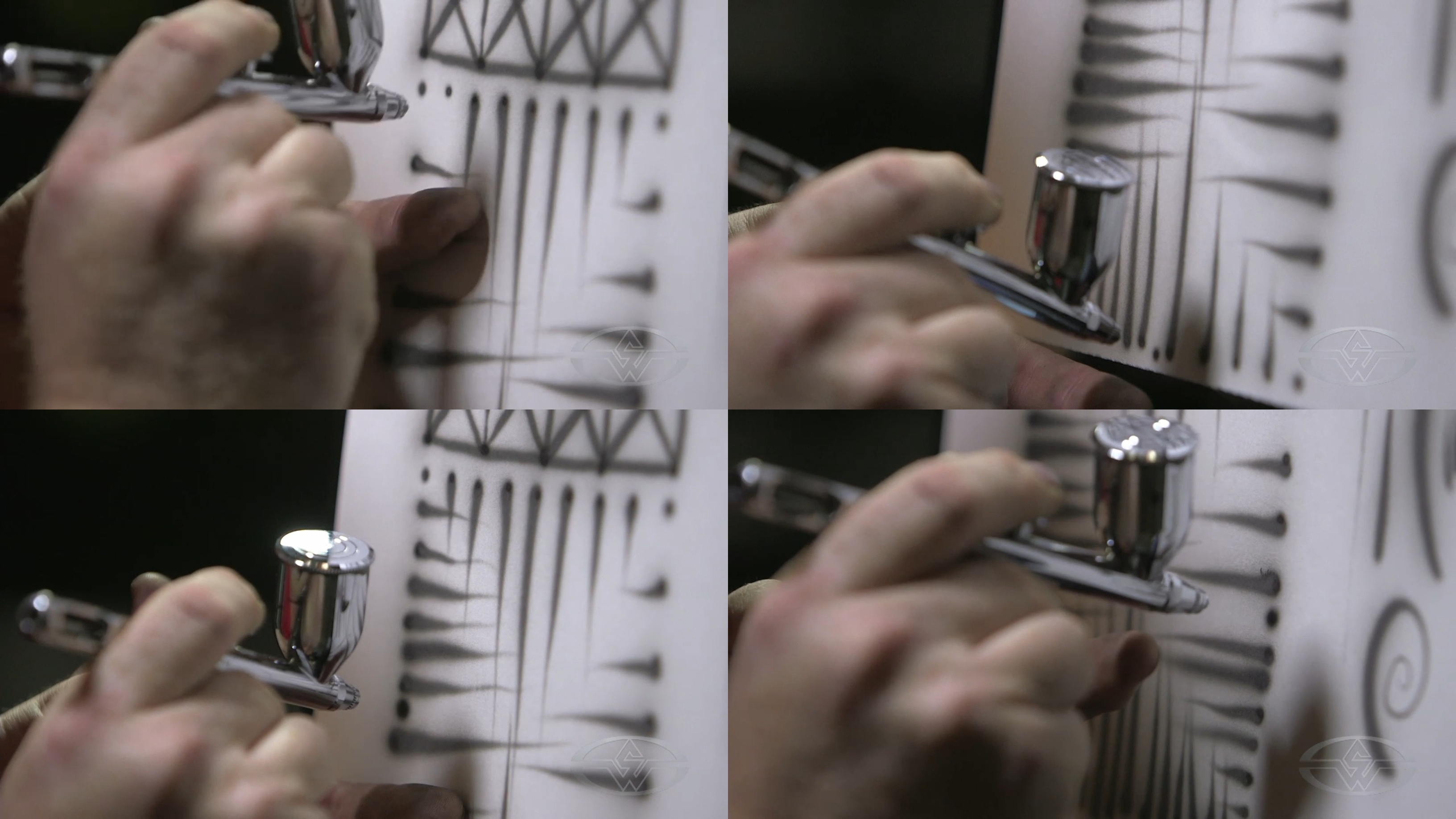 Craig Fraser adds more dagger strokes in between the ones he's already made.