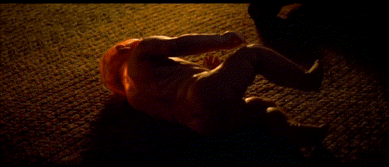 The final&nbsp;mechanical baby puppet built by Rick Baker in Starman's transformation sequence. Gif courtesy of&nbsp;Columbia Pictures.