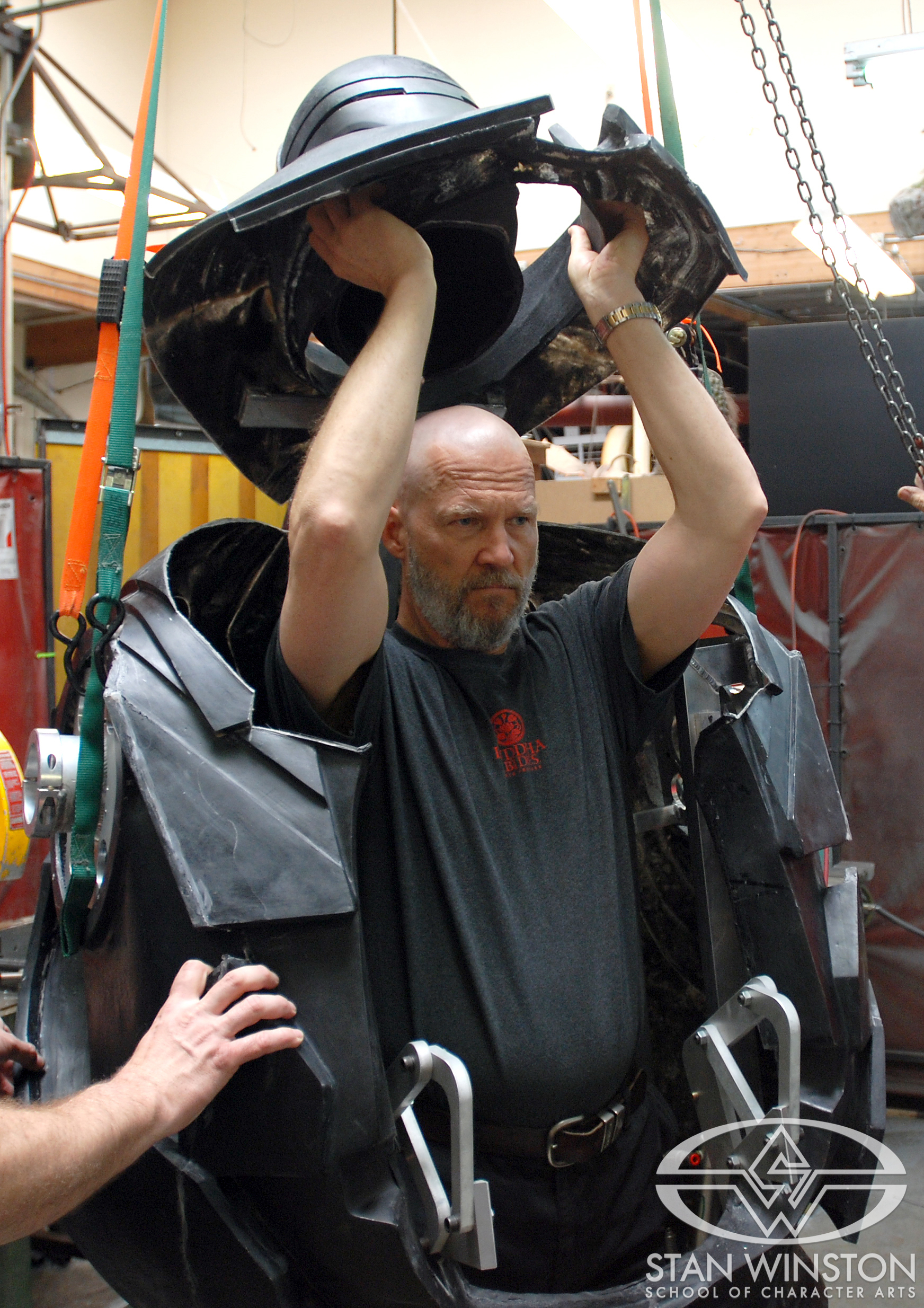 Jeff Bridges tests the upper section of the&nbsp;Iron Monger suit.