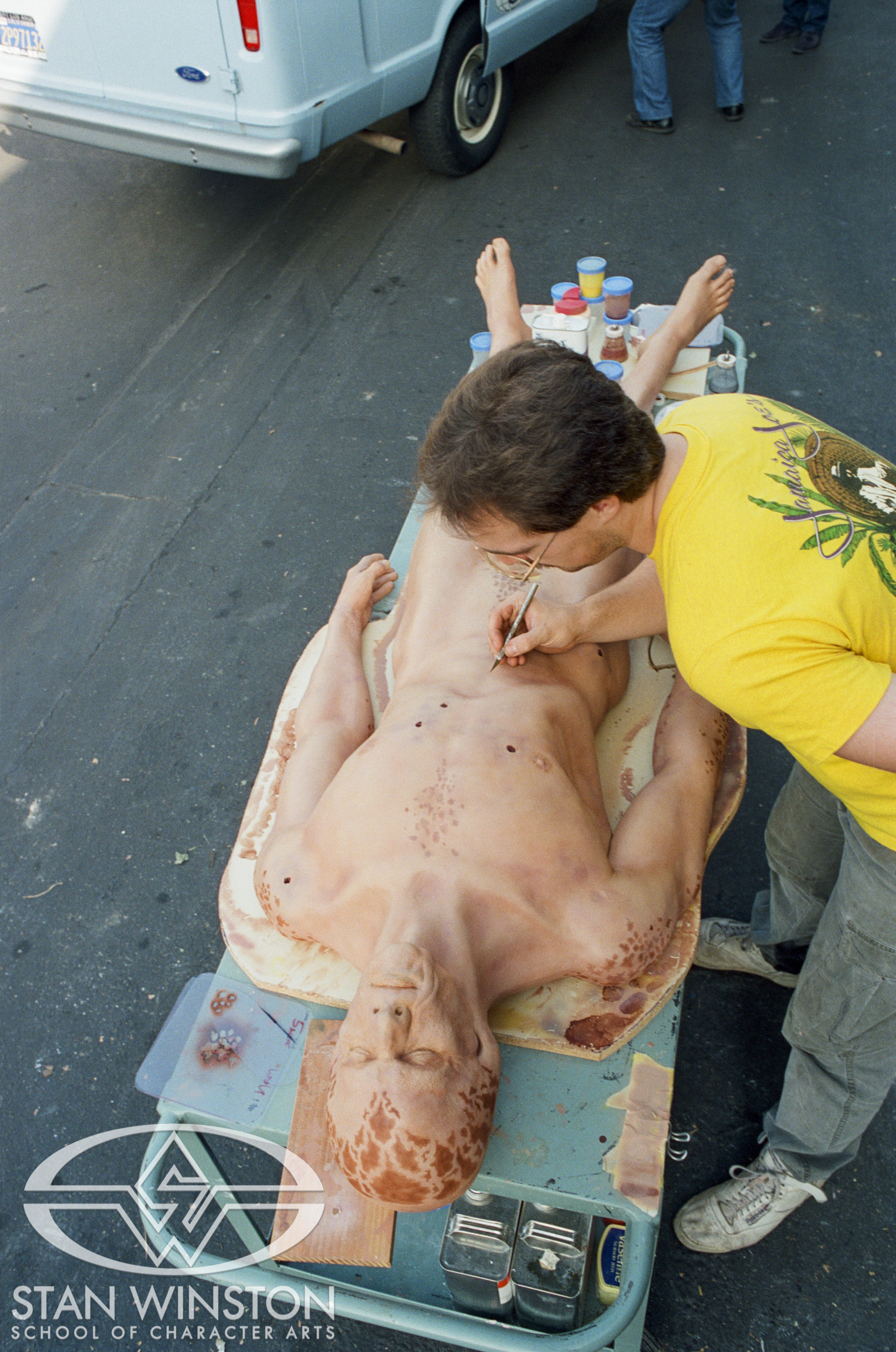 Mike Trcic puts the&nbsp;final touches on an alien newcomer's dead&nbsp;body dummy for an&nbsp;autopsy scene.