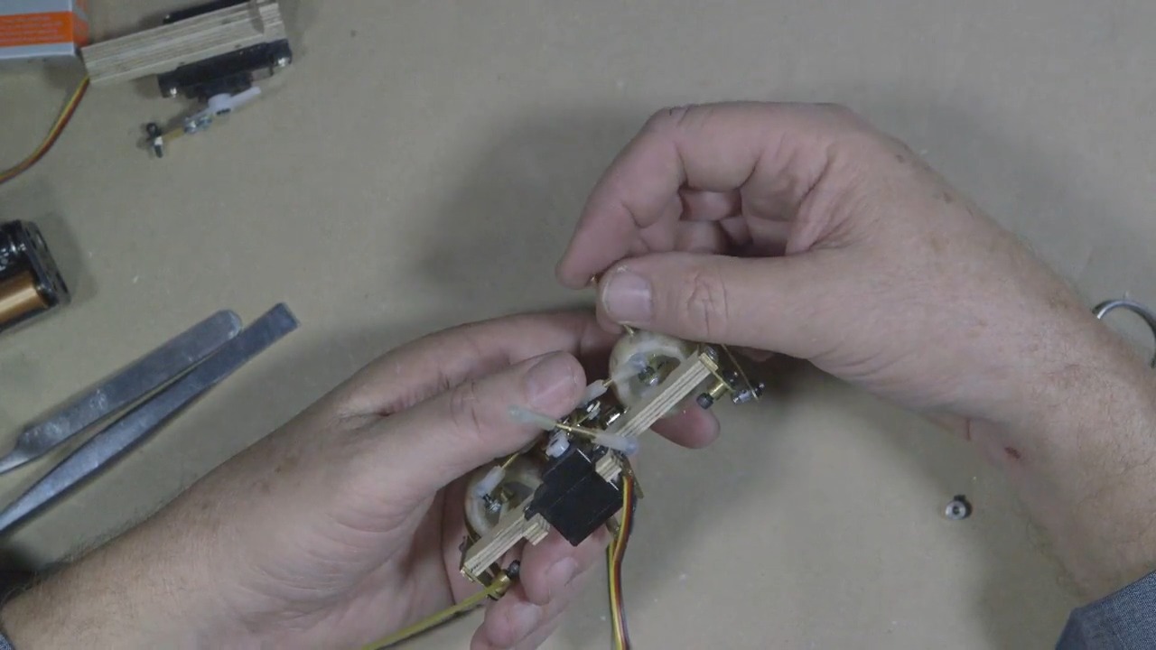 Caton-Largent puts the axle through the top of the animatronic eye.
