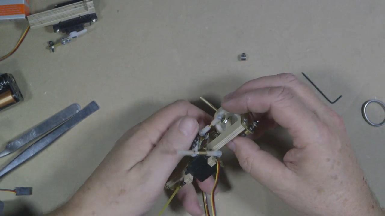 Caton-Largent rotates his mechanism for a&nbsp;look at the axle before proceeding to the next step.
