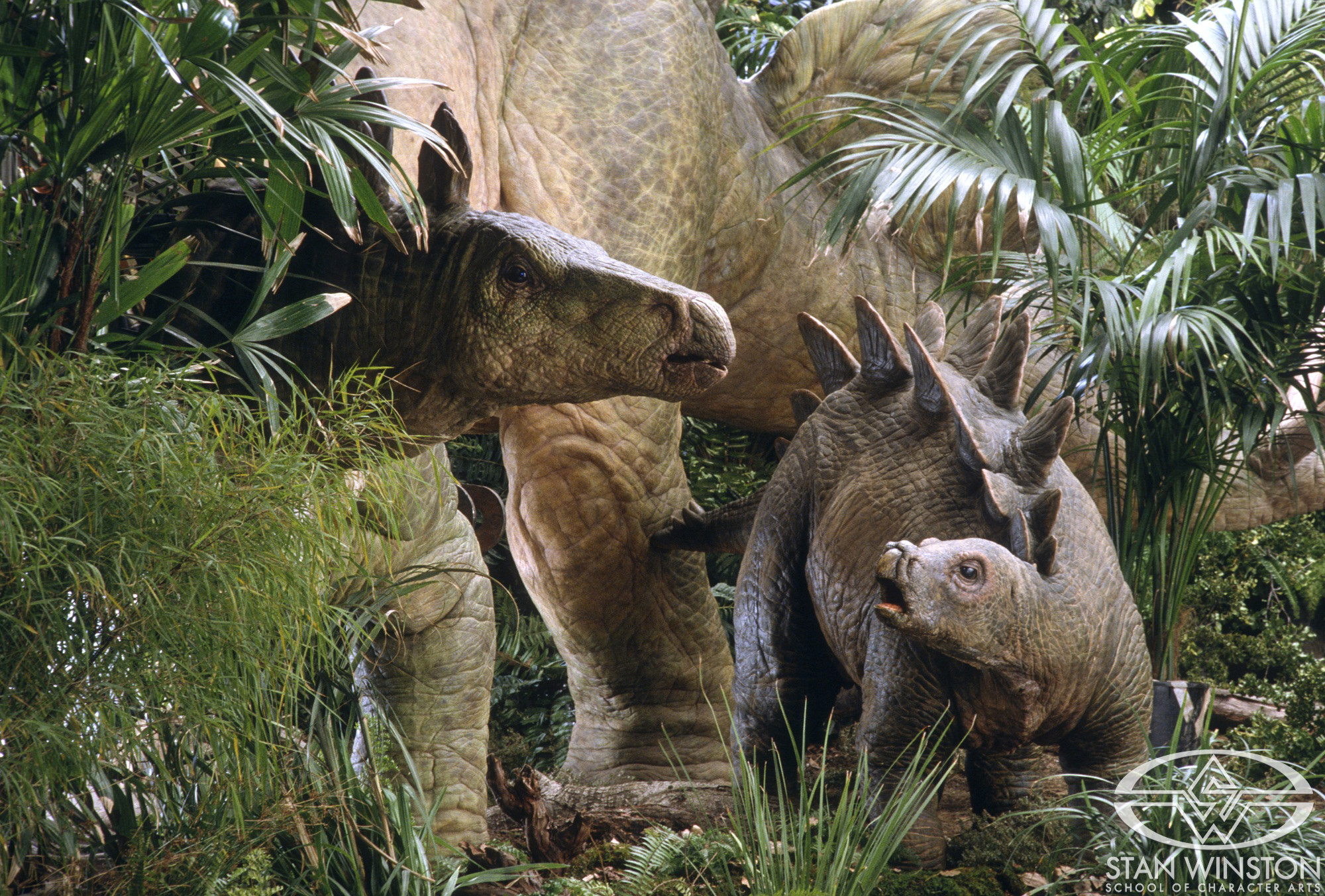 Promo image of the adult and the baby Stegosaurus from&nbsp;The Lost World: Jurassic Park.