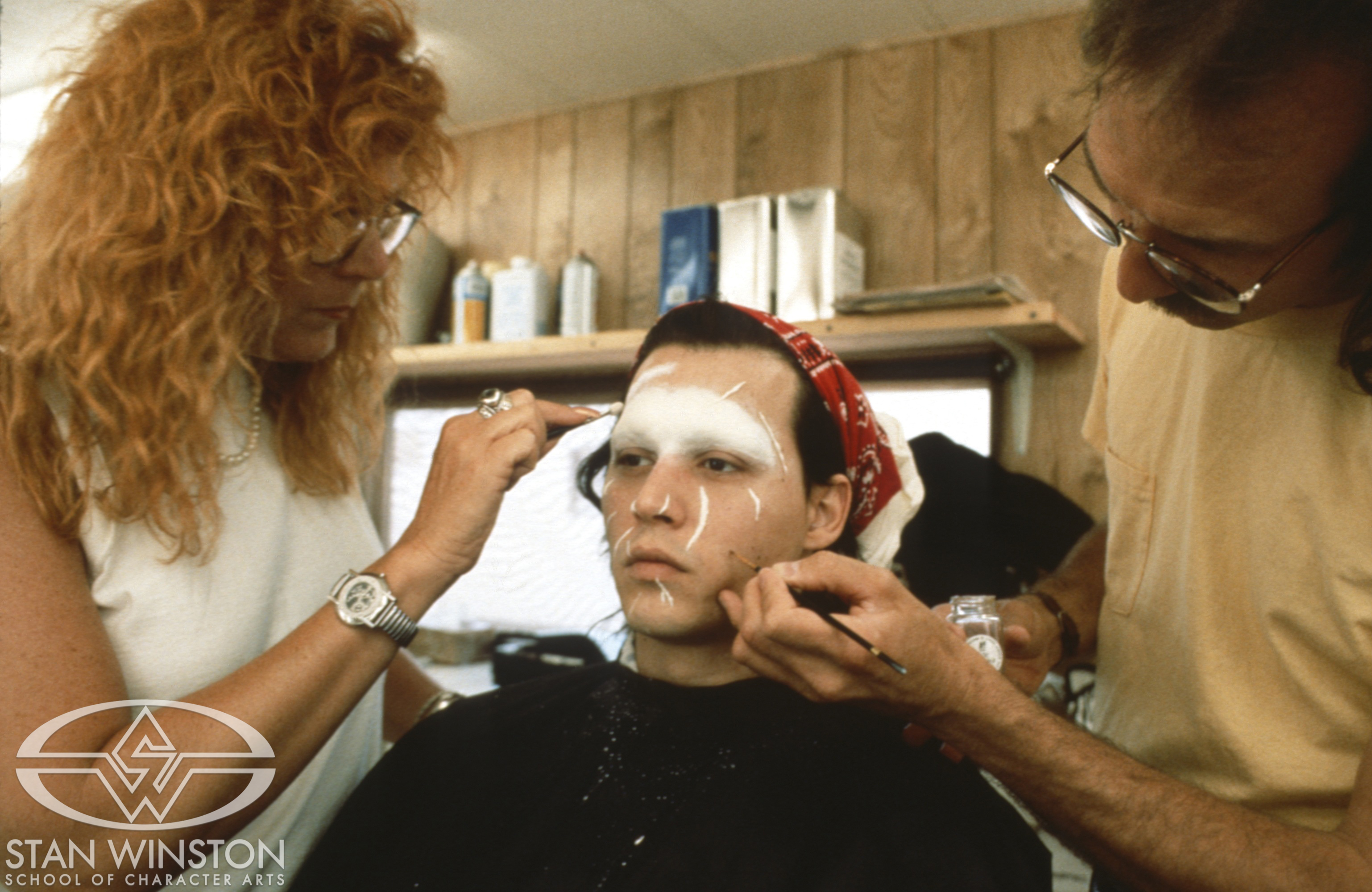 Makeup artists Ve&nbsp;Neill and Matthew W.&nbsp;Mungle apply a brow piece&nbsp;— sculpted by Shane&nbsp;Mahan — and scars to&nbsp;Depp on set.