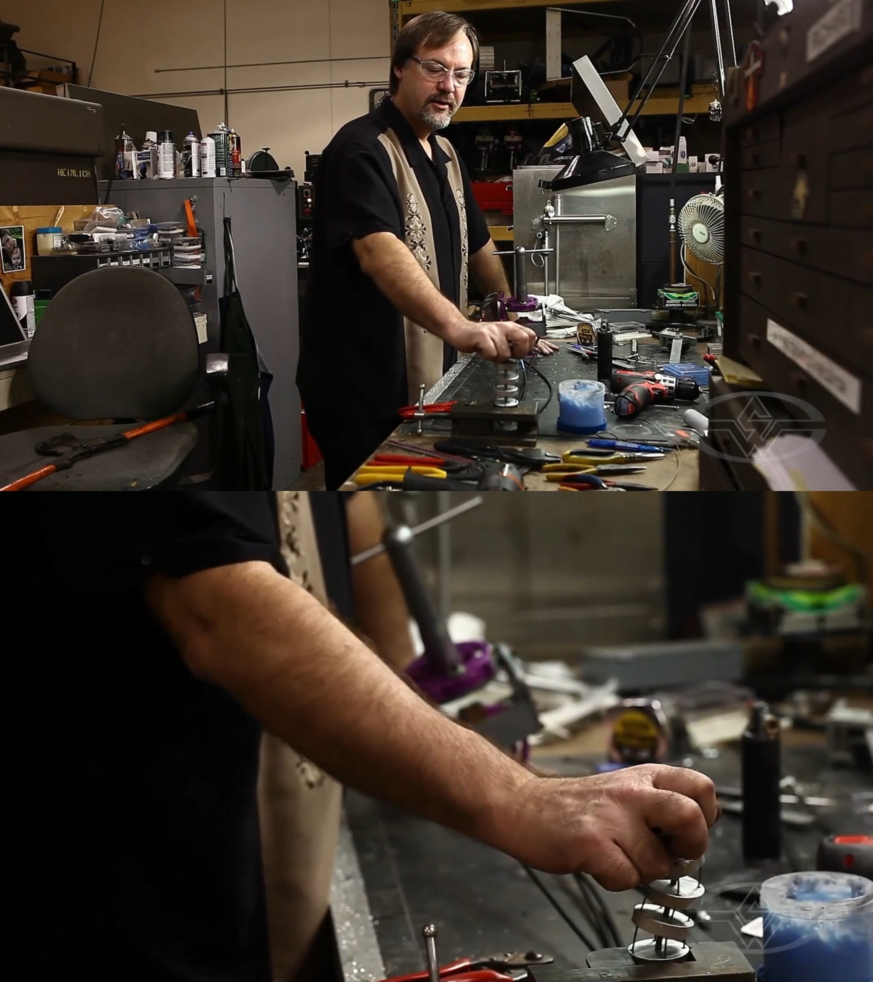 Richard Landon applies weight to the mechanism to demonstrate how it causes the tentacles to sag.