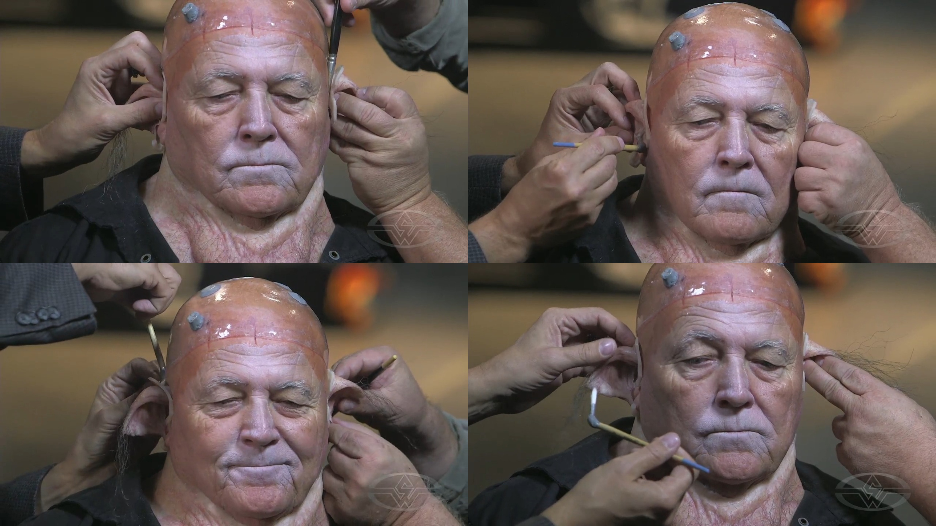 Joel Harlow and Steve Buscaino&nbsp;continue carefully attaching the silicone ears.