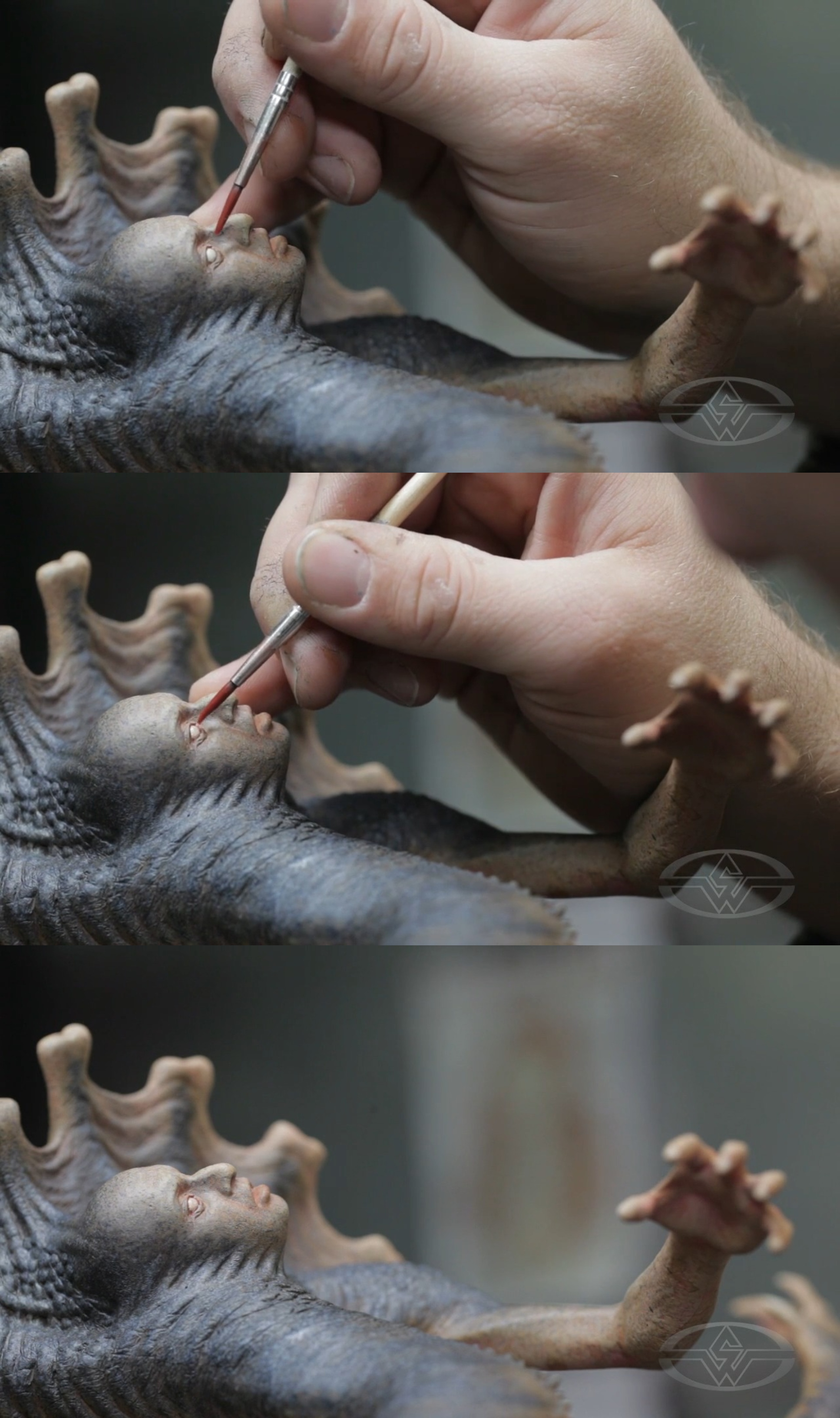 Tapping on the eyes with a red wash, Timothy Martin adds a bloodshot effect, enhancing the horror of the Leviathan.