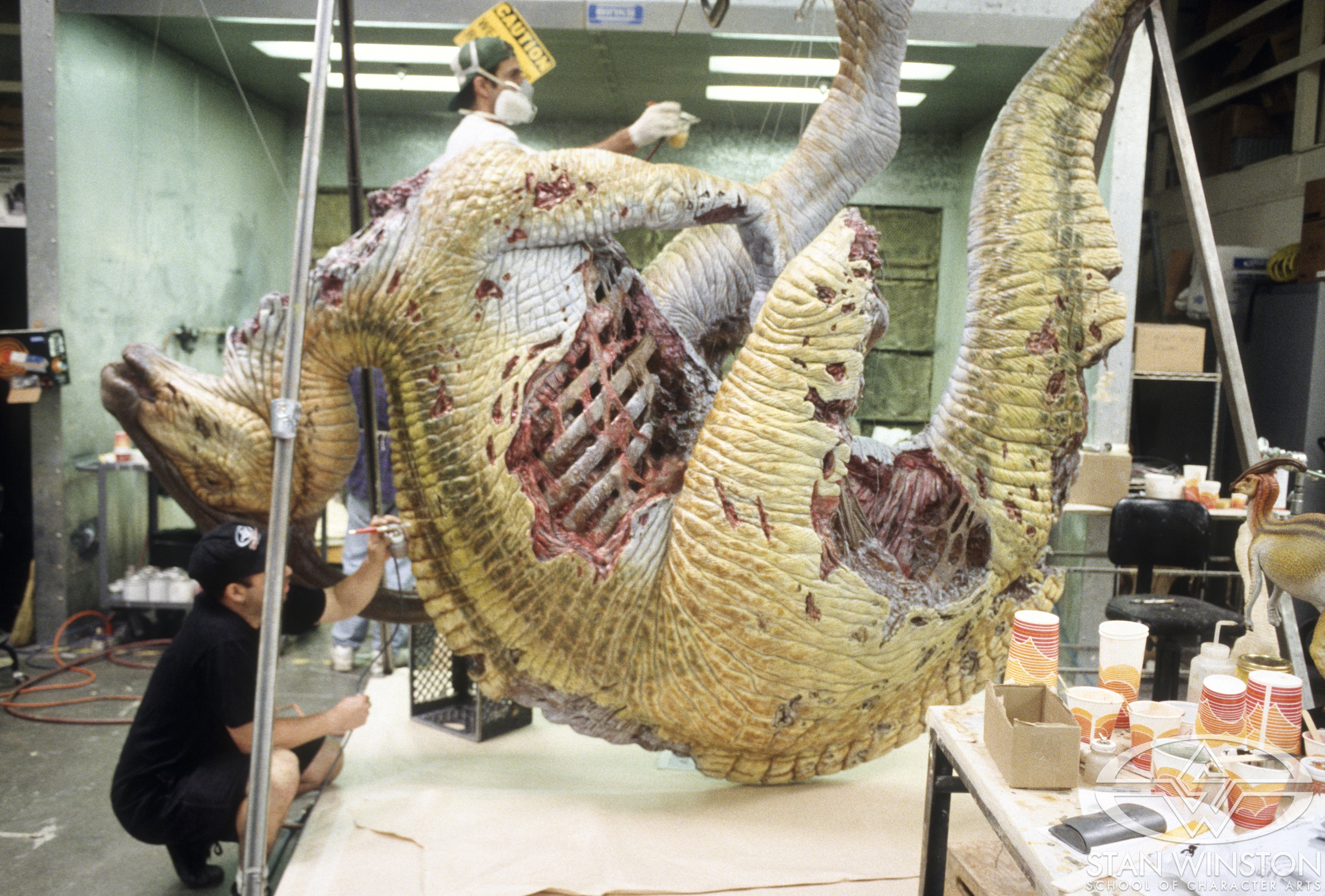 Painting the dead Parasaurolophus at Stan Winston Studio.