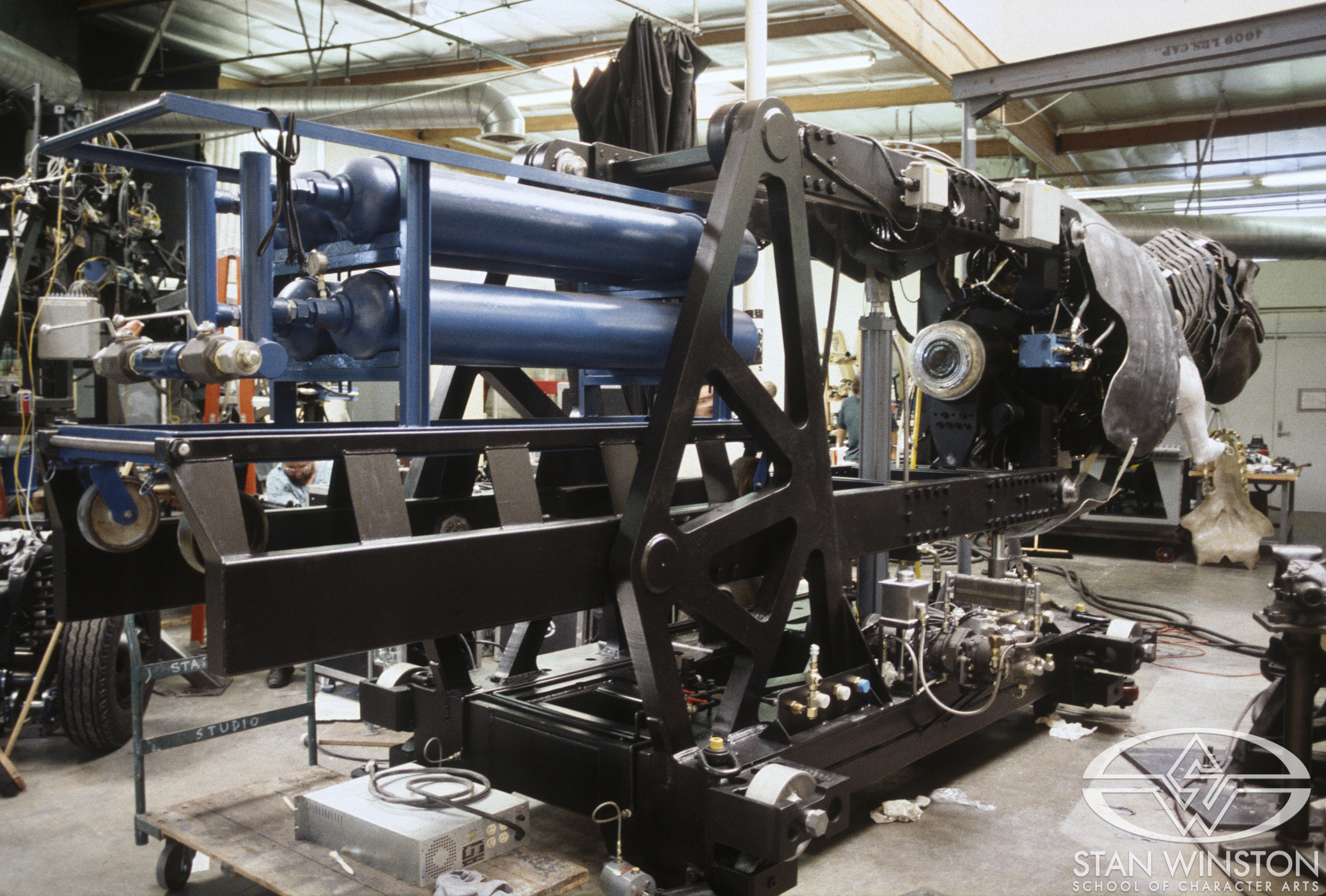 Work-in-progress placing&nbsp;the male T-Rex&nbsp;onto the&nbsp;custom-welded cart.