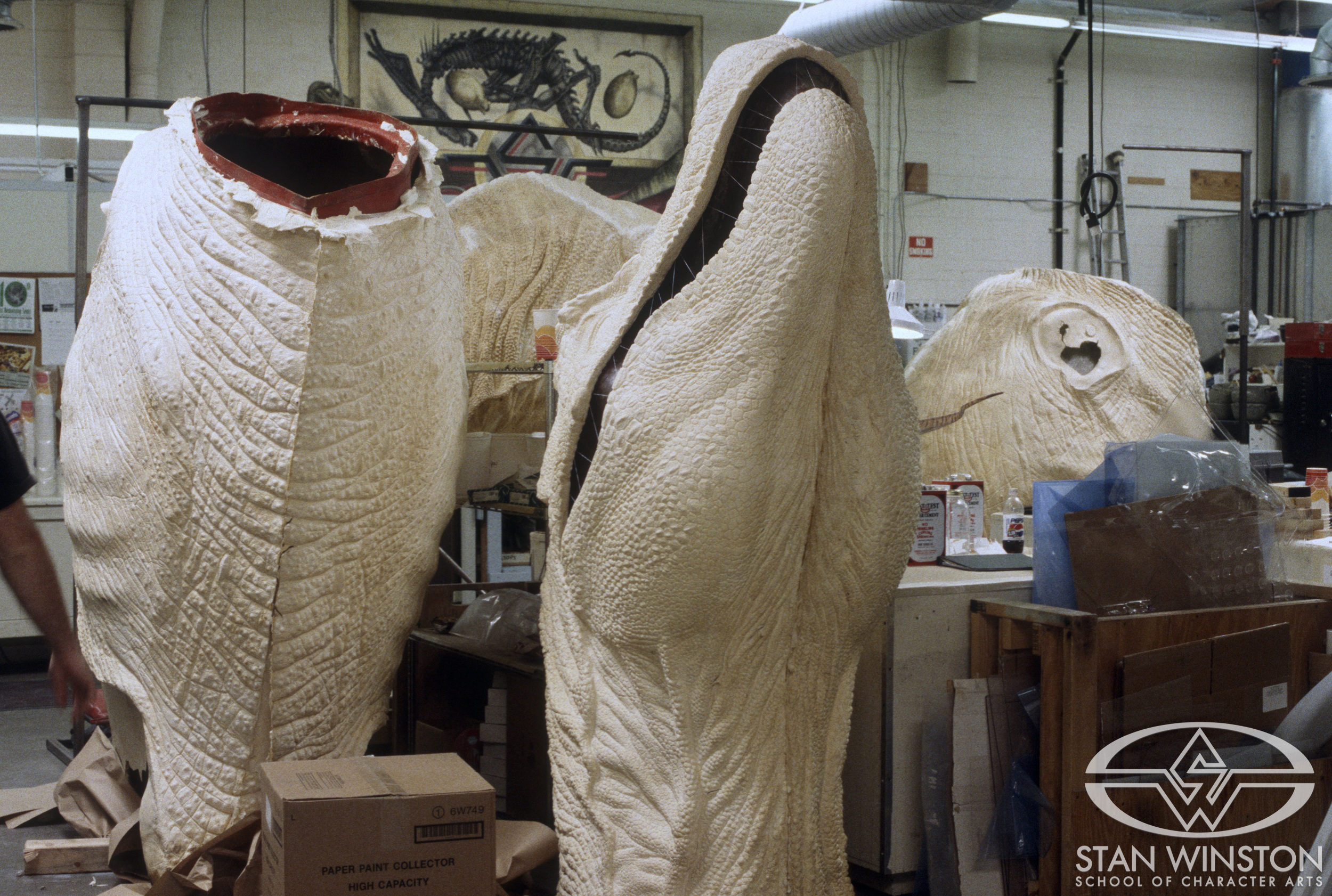 Various male T-Rex foam body parts at&nbsp;Stan Winston Studio.