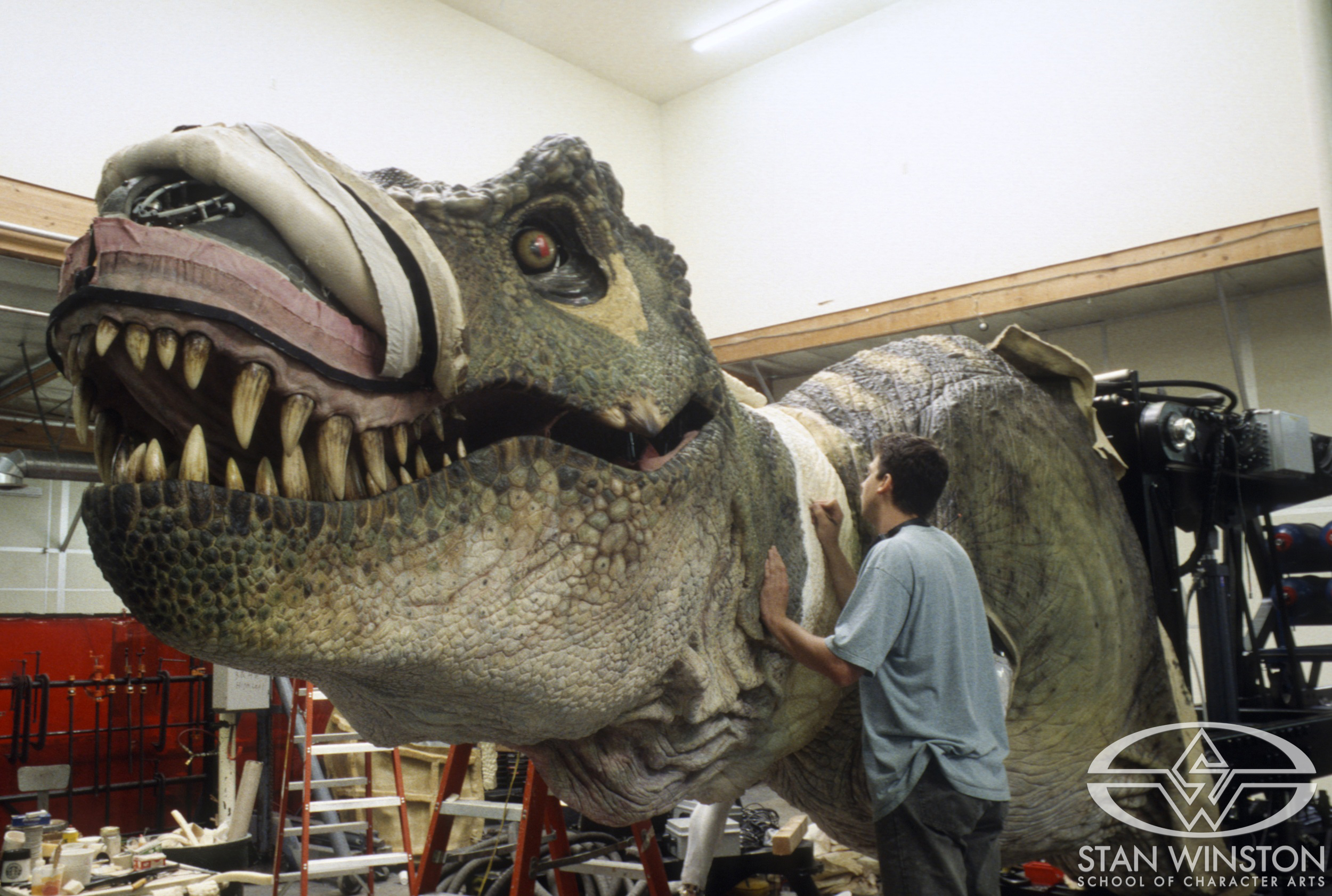 Eric Ostroff works on the male T-Rex skin&nbsp;covering the life-size animatronics.