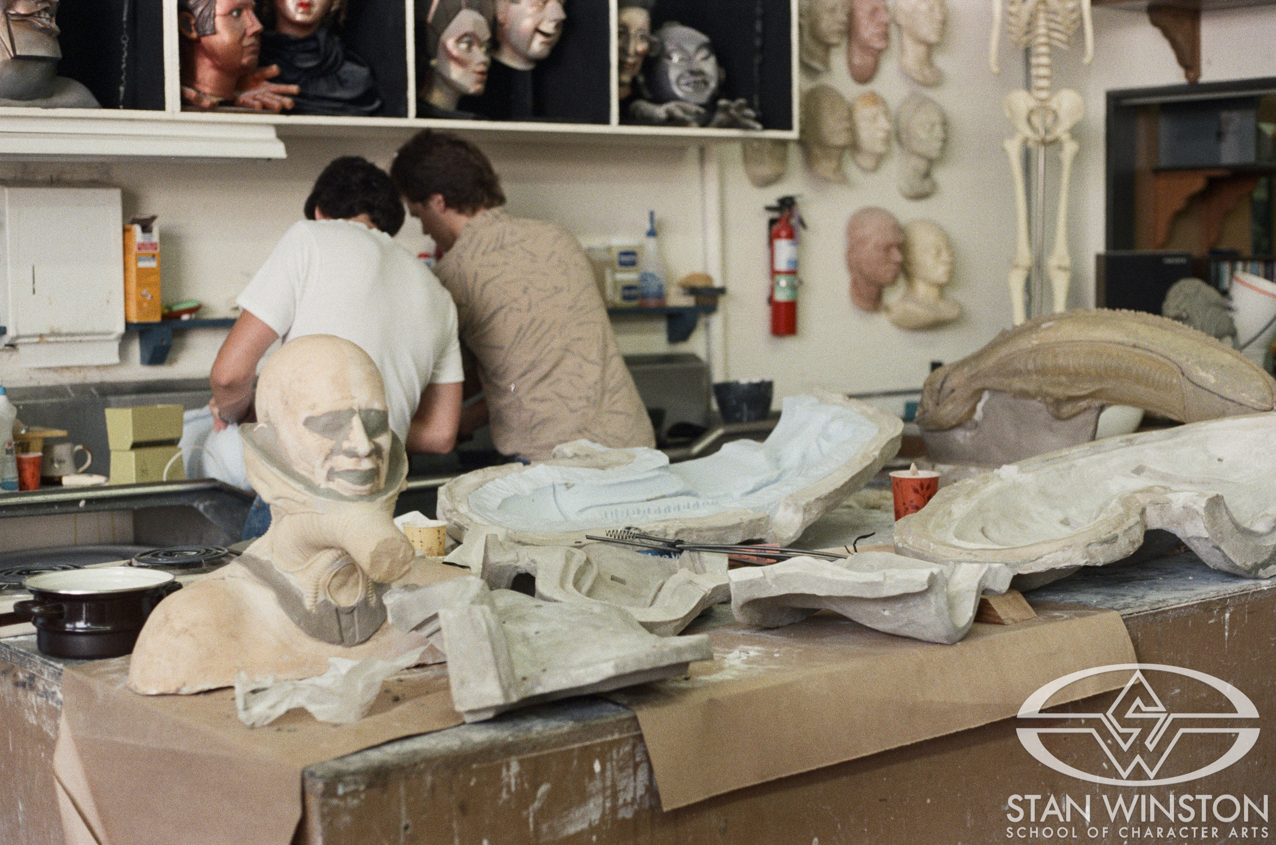 Work-in-progress casting and molding a xenomorph head at Stan Winston Studio.