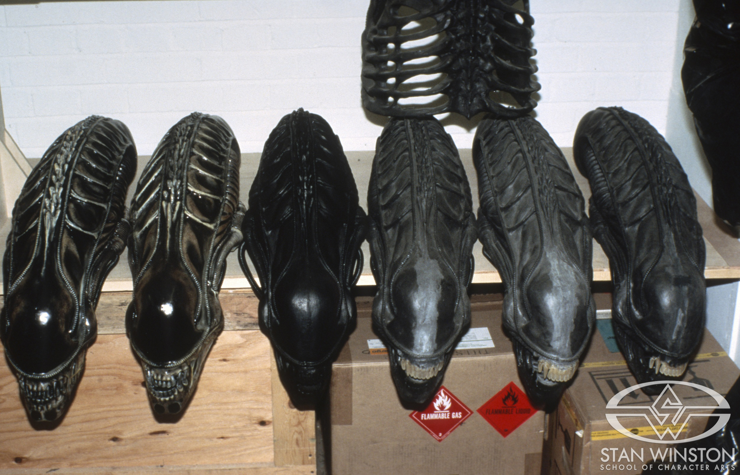 Alien&nbsp;Warrior heads in various stages of completion.