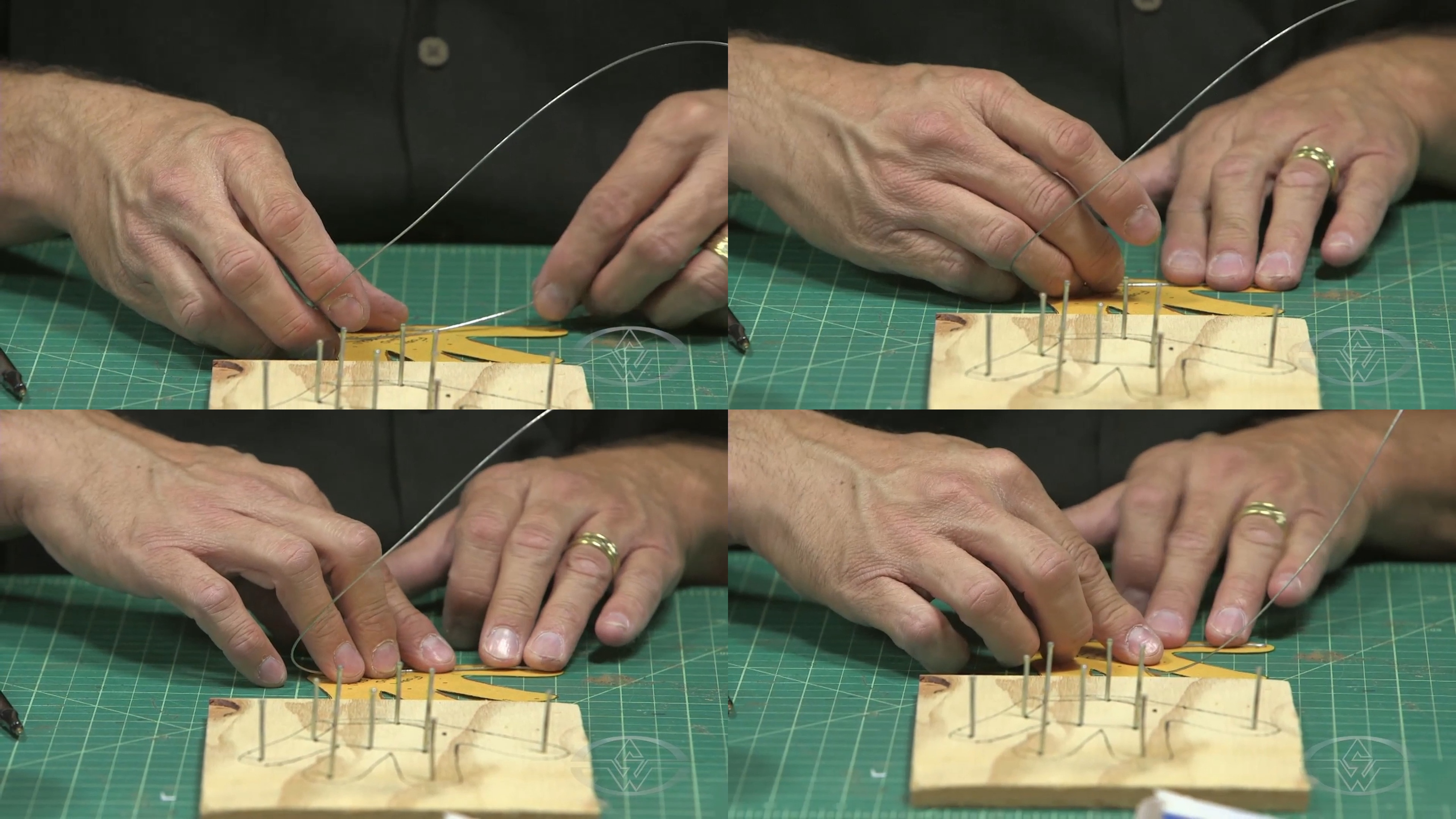 BJ Guyer follows his foam hand pattern template to get the sizing of his puppet's wire fingers just right.