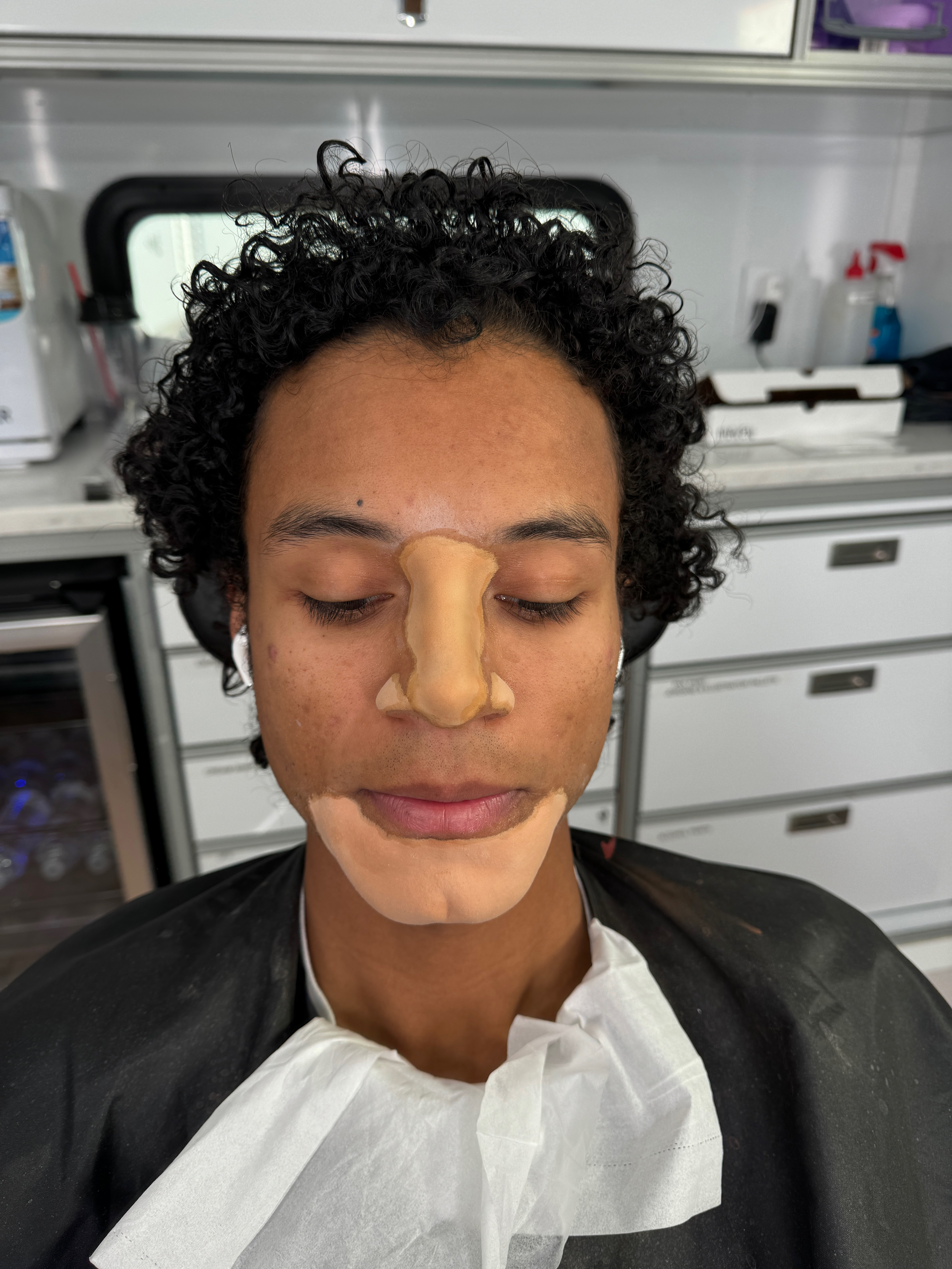 Here, Jaafar is seen during the application of the&nbsp;thinner nose&nbsp;and&nbsp;cleft chin appliances. Image courtesy Bill Corso/Lionsgate.