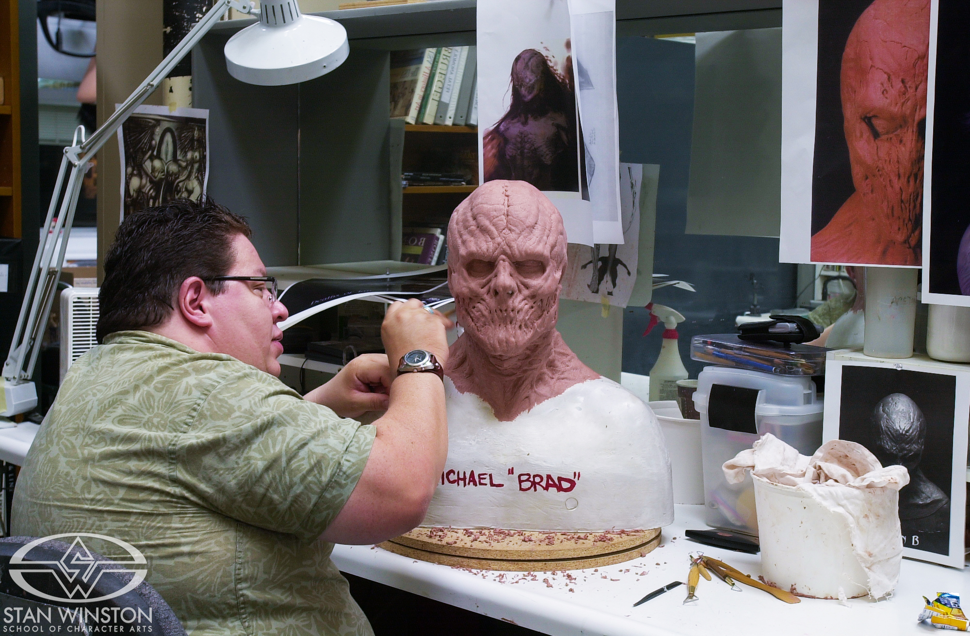 Richie Alonso works on the head sculpt of&nbsp;Michael Dixon's Harvester character.